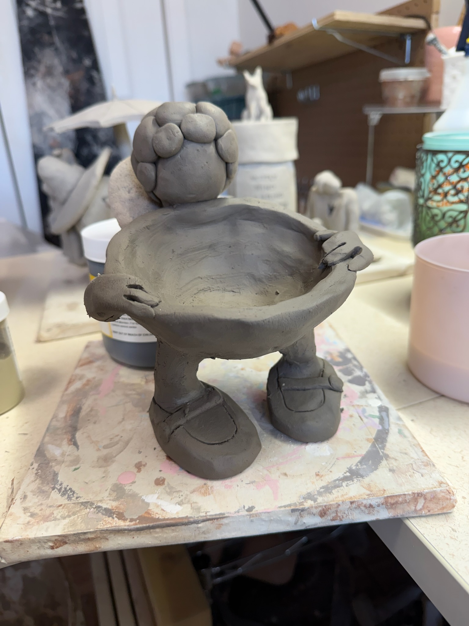 Raw clay figurine bowl